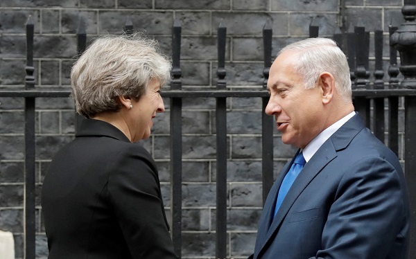 British Prime Minister Theresa May greets Israeli Prime Minister Benjamin Netanyahu. (AP Photo/Matt Dunham)