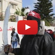 A supporter of the PFLP terrorist organization, whose flag flew in London. (AP Photo/Adel Hana)
