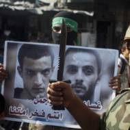 Palestinians celebrate terrorist massacre at a Jerusalem synagogue. (Abed Rahim Khatib/Flash90)