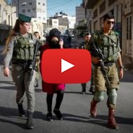 Israeli border police arrest a Palestinian with a knife. (Wisam Hashlamoun/Flash90)