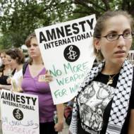 An Amnesty International demonstration. (AP Photo/Manuel Balce Ceneta)