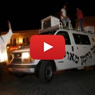 Dancing on a van roof in Jerusalem. (Miriam Alster/Flash90)