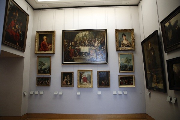 Paintings looted by Nazis during World War II on display at the Louvre museum, in Paris