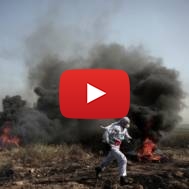Black smoke designed to obscure the IDF's view of violent riots. (AP Photo/ Khalil Hamra)