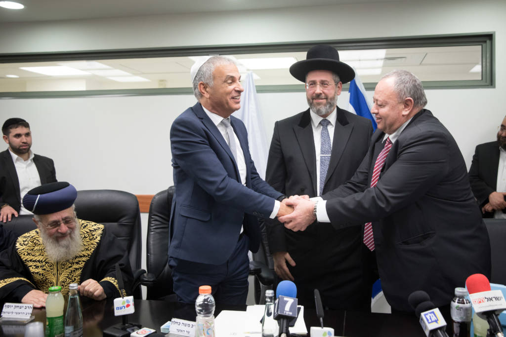 Israel's Chief Rabbis and Hussein Jaber (R) before Passover. (Miriam Alster/Flash90)