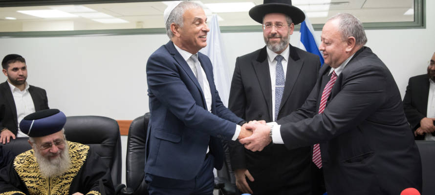 Israel's Chief Rabbis and Hussein Jaber (R) before Passover. (Miriam Alster/Flash90)