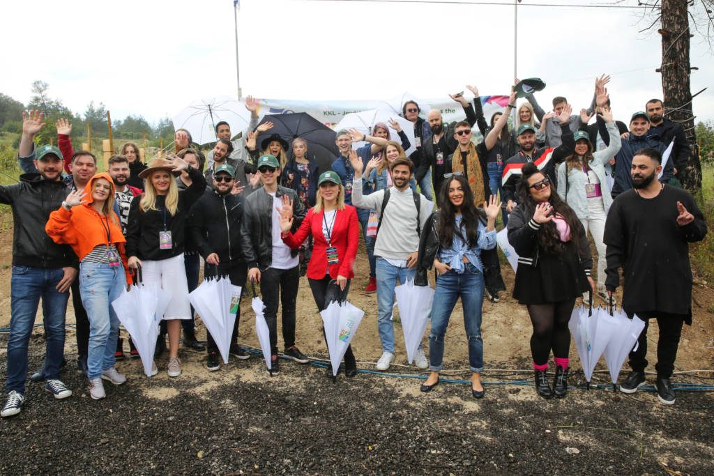 Eurovision competitors from plant trees in Zor'a Forest. (Yossi Zamir/Flash90)