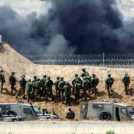 IDF forces face Palestinian rioters on the Gaza border