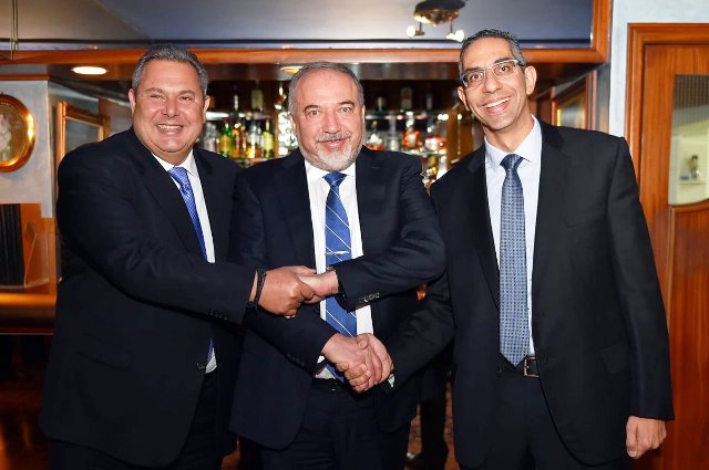 Greek Defense Minister Panos Kammenos (L) and his Israeli and Cypriot counterparts Avigdor Liberman (C) and Savvas Angelides