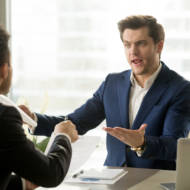 businessmen disagreeing
