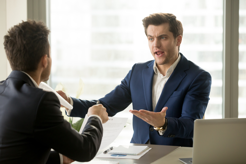 businessmen disagreeing
