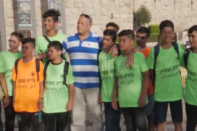 Israeli and Arab youth gather for a soccer tournament. (screenshot)