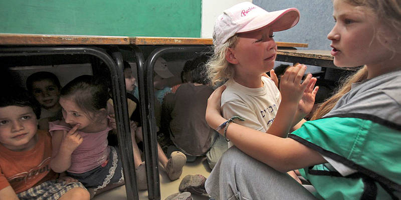 Children flee rockets