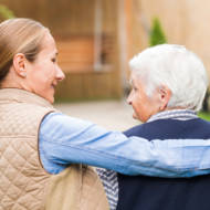 elderly person with caregiver