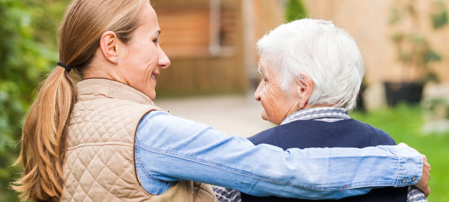 elderly person with caregiver