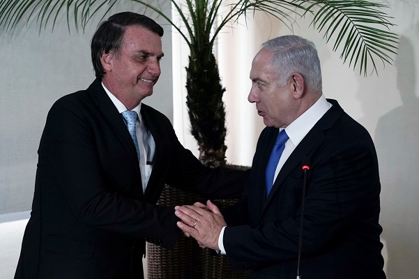 Brazil's President-elect Jair Bolsonaro, left, and Israel's Prime Minister Benjamin Netanyahu. (Leo Correa/Pool Photo via AP)