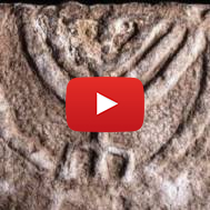 The seven-branched menorah on a large stone slab found in Tiberias. (Tal Rogovski)