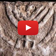 The seven-branched menorah on a large stone slab found in Tiberias. (Tal Rogovski)