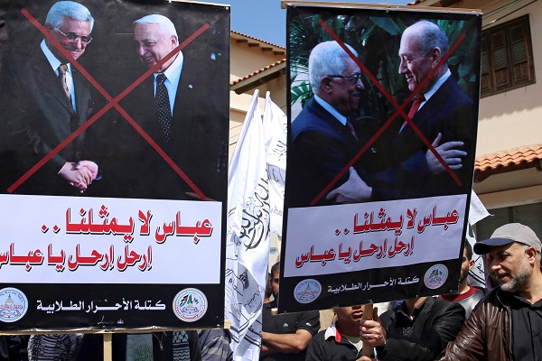 Pro-Hamas protesters hold protest Fatah's Mahmoud Abbas. (AP Photo/Adel Hana)