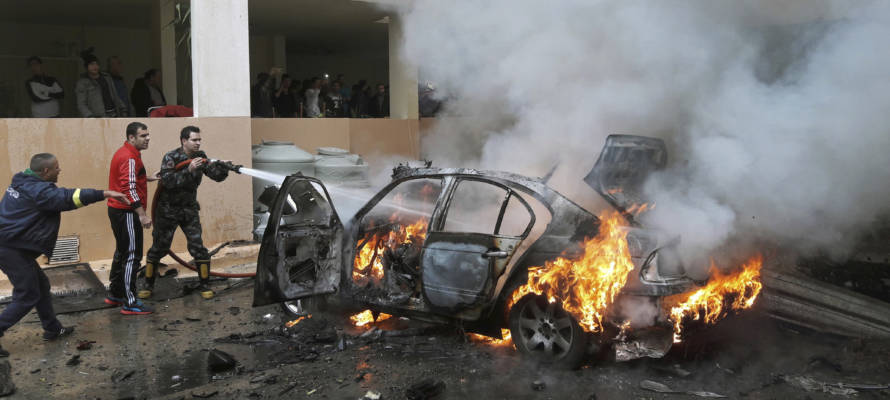 A Palestinian's burning car blown up in Lebanon. (AP Photo/Mohammed Zaatari)