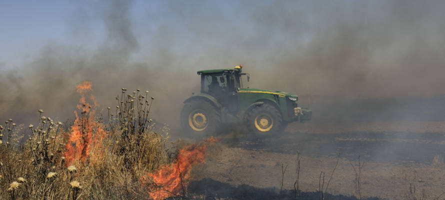 A fire started in Israel by terrorists in the Gaza Strip. (AP Photo/Tsafrir Abayov)