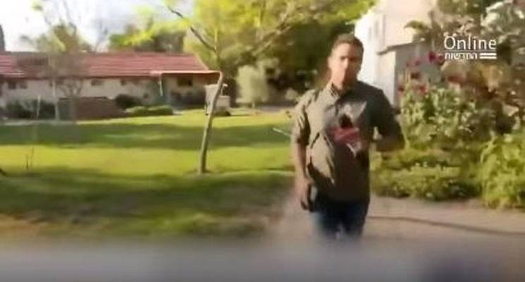 reporter runs from rocket attack