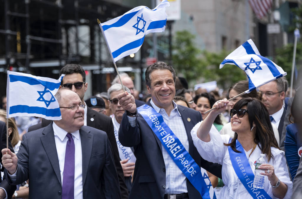 New York Gov. Andrew Cuomo, center, and Consul General of Israel in New York Dani Dayan. (AP Photo/Craig Ruttle)