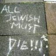 Anti-Semitic graffiti on a north London street  (AP/CST)