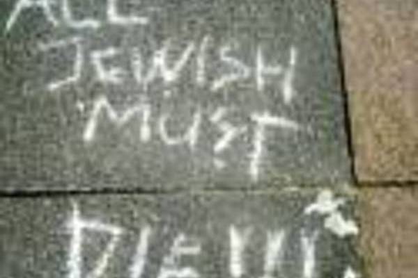 Anti-Semitic graffiti on a north London street (AP/CST)