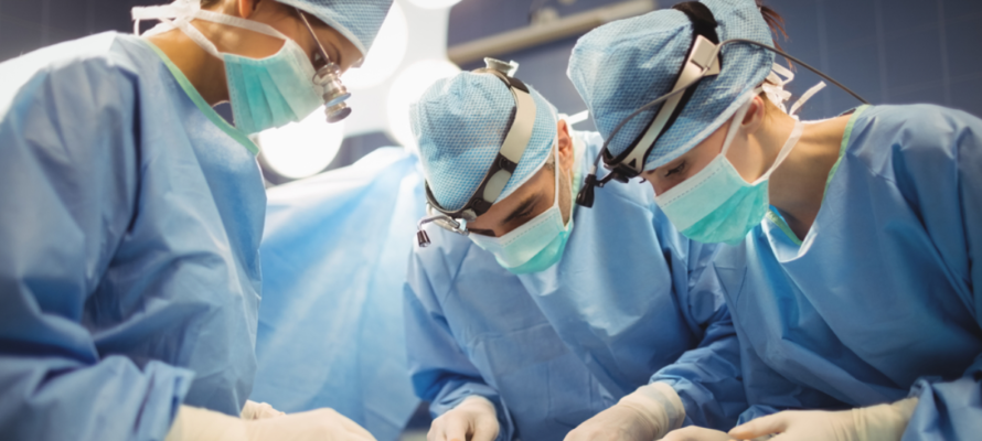 Surgeons operating