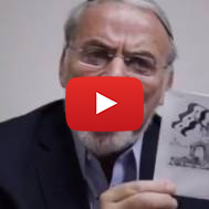 Dov Hikind holds cartoon by Holocaust denier