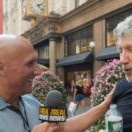 Roger Waters spits out water when asked about Iran's human rights abuses. (Screenshot)
