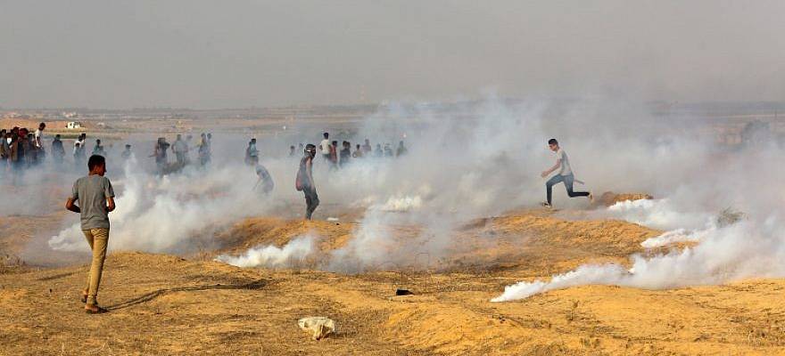 Palestinian protesters clash with Israeli forces near the Gaza-Israel border, east of Rafah in the southern Gaza Strip, Sept. 13, 2019.
