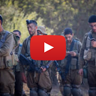 Religious IDF soldiers pray during training.