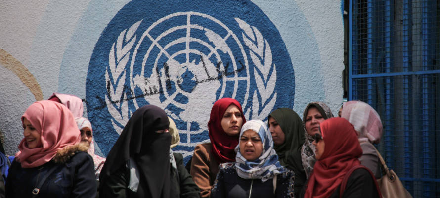 UNRWA staff members outside the UNRWA offices in Gaza City on April 14, 2019.
