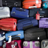 Piled airport luggage (Shutterstock)