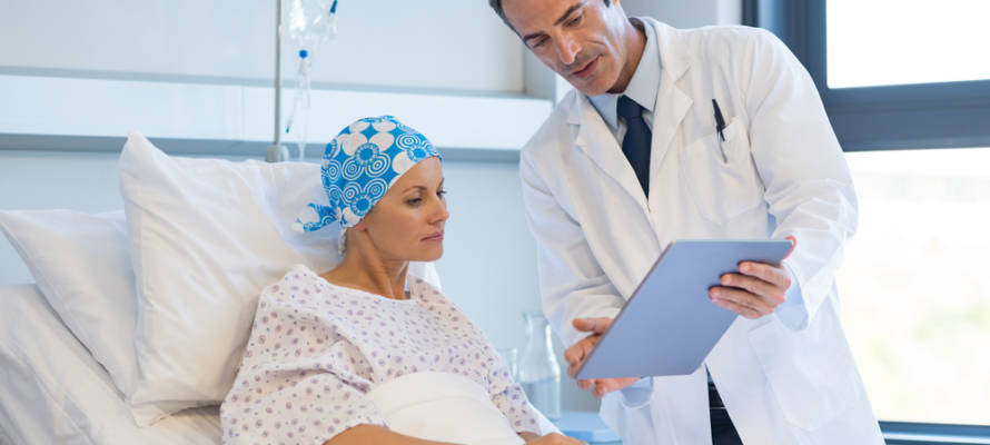 Doctor with cancer patient