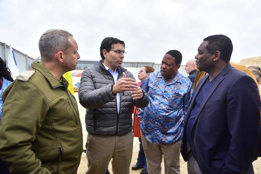 Israel's UN Ambassador Danny Danon, second from left, briefing foreign envoys as an IDF representative looks on during tour in southern Israel, December 12, 2019.