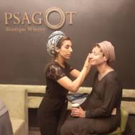 Volunteer puts make-up on B'Shvilech participant (Courtesy)