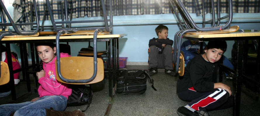 children run for safety during rocket attack