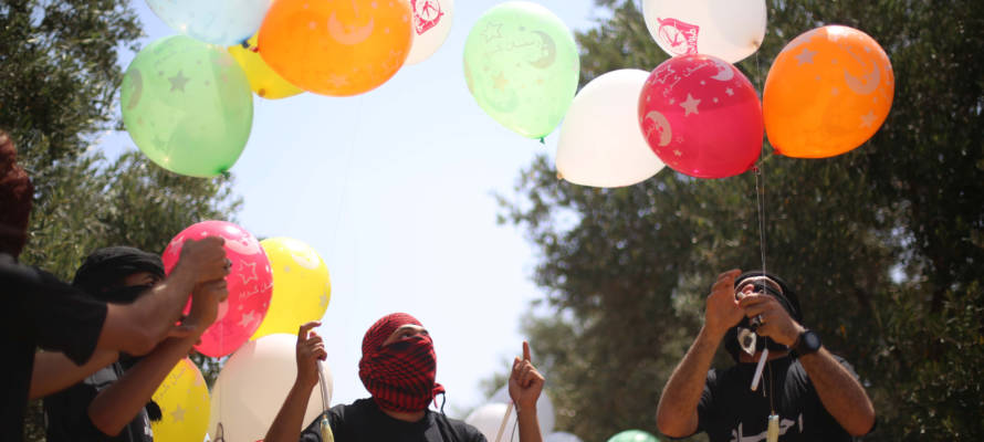 Palestinian youth prepare molotov cocktails