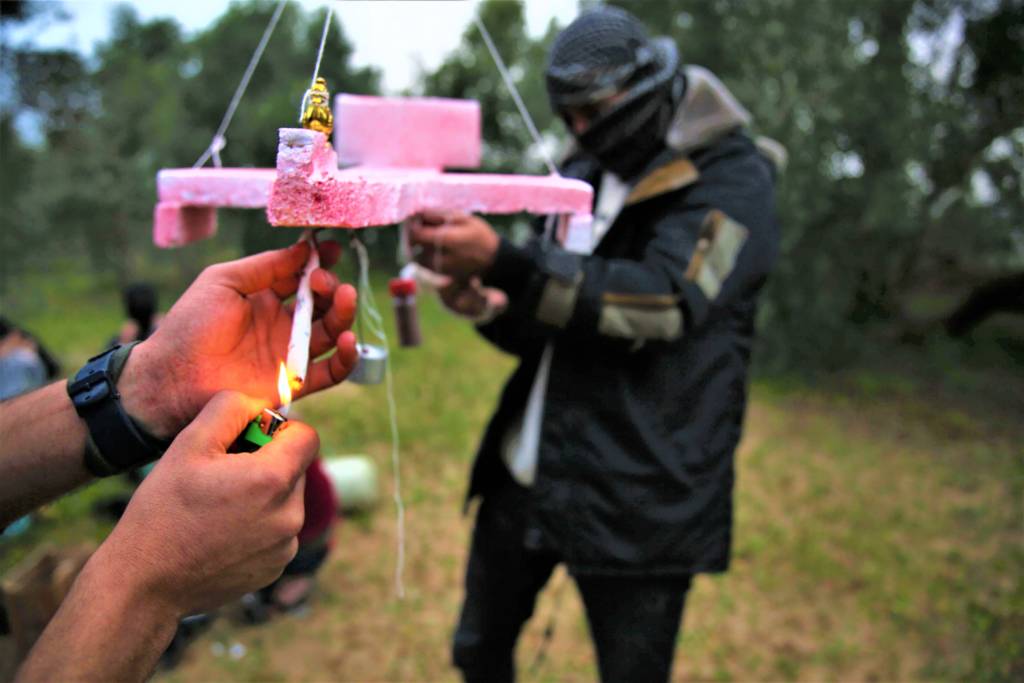 Palestinians prepare an incendiary airborne device