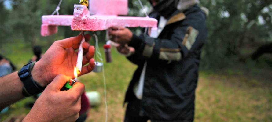 Palestinians prepare an incendiary airborne device