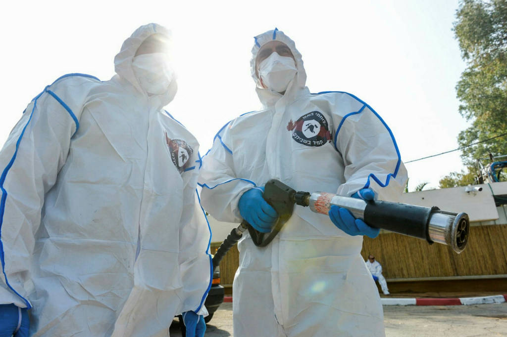 Firefighters disinfect coronavirus quarantine area Sheba medical center