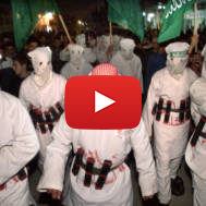 Palestinians in suicide bomber outfits in 2002