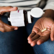 taking a capsule pill