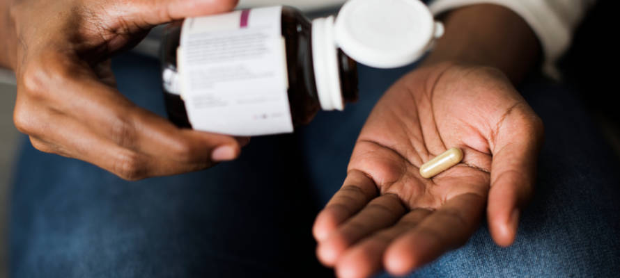 taking a capsule pill