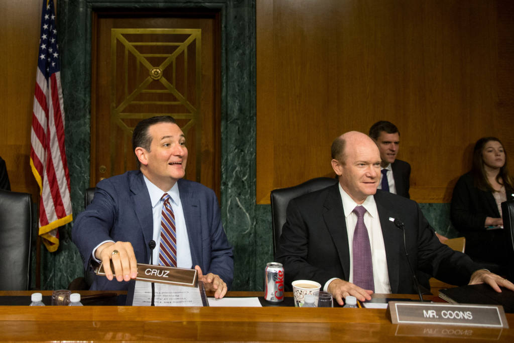 Senators Ted Cruz, R-Texas, left, and Chris Coons, D-Del.
