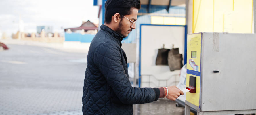 Man using ATM