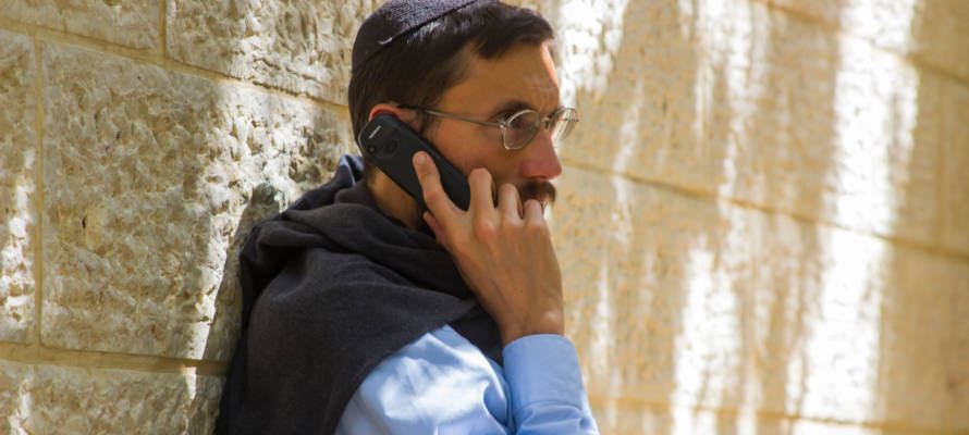 Man on phone in Jerusalem